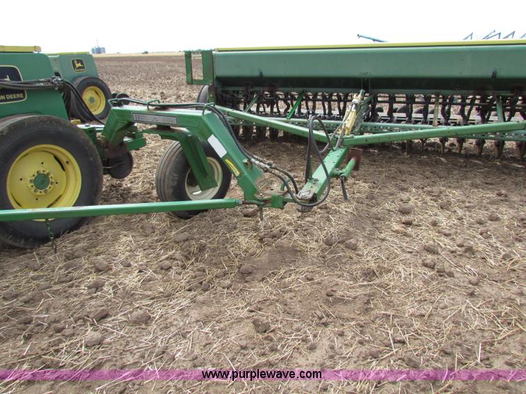 image for item N9091 (3) John Deere 8300 drills
