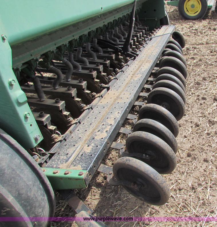 image for item N9091 (3) John Deere 8300 drills