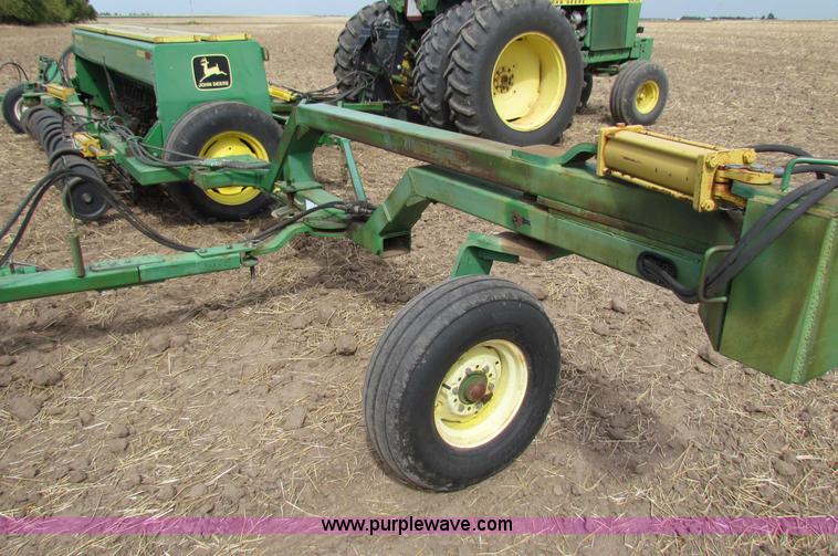 image for item N9091 (3) John Deere 8300 drills