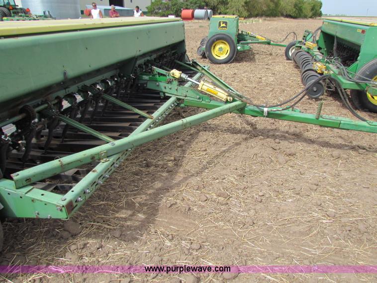 image for item N9091 (3) John Deere 8300 drills