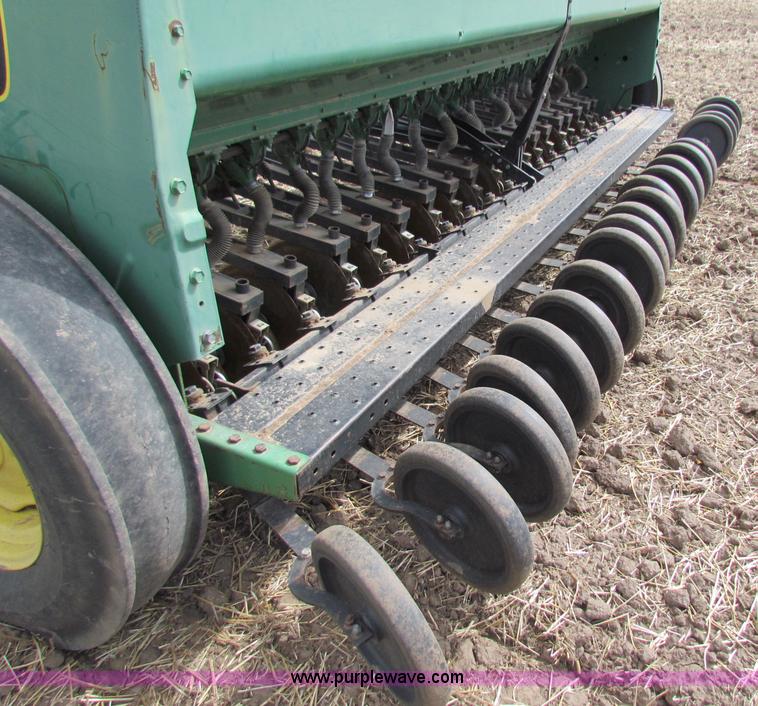 image for item N9091 (3) John Deere 8300 drills