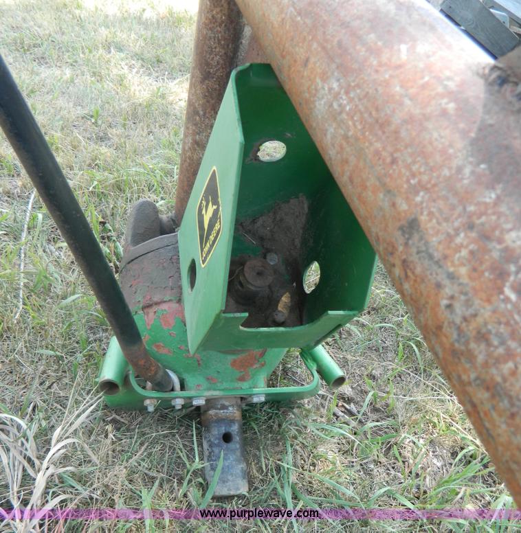 image for item T9364 John Deere post hole digger