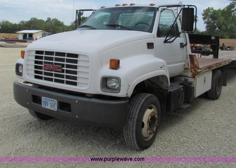 image for item B7370 1999 GMC C5500 flatbed truck