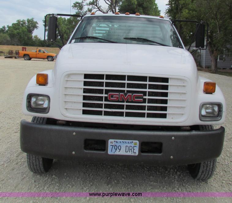 image for item B7370 1999 GMC C5500 flatbed truck