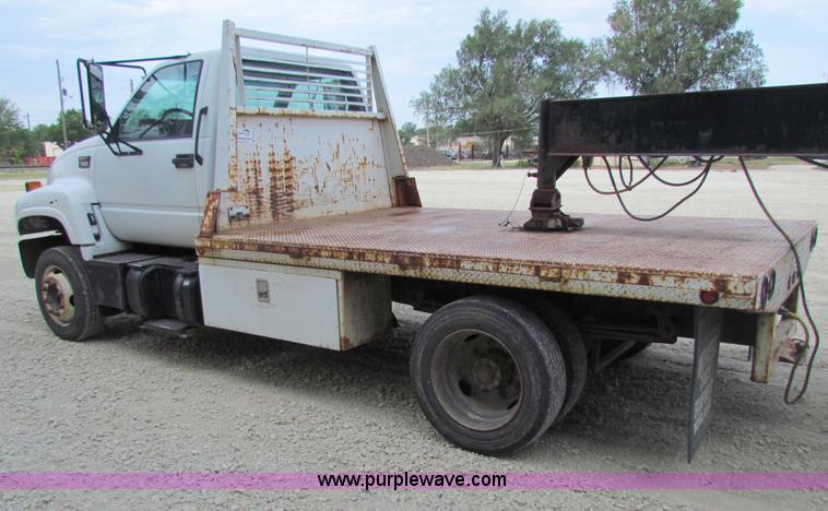 image for item B7370 1999 GMC C5500 flatbed truck