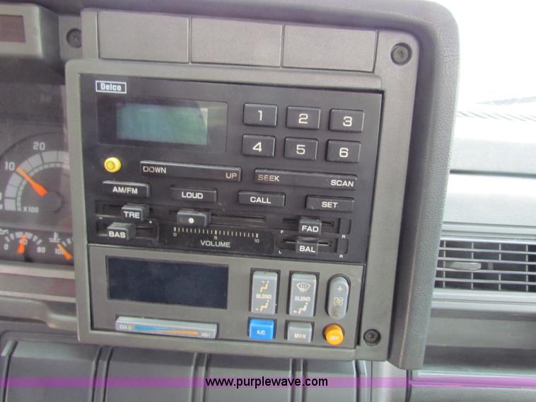 image for item B7370 1999 GMC C5500 flatbed truck