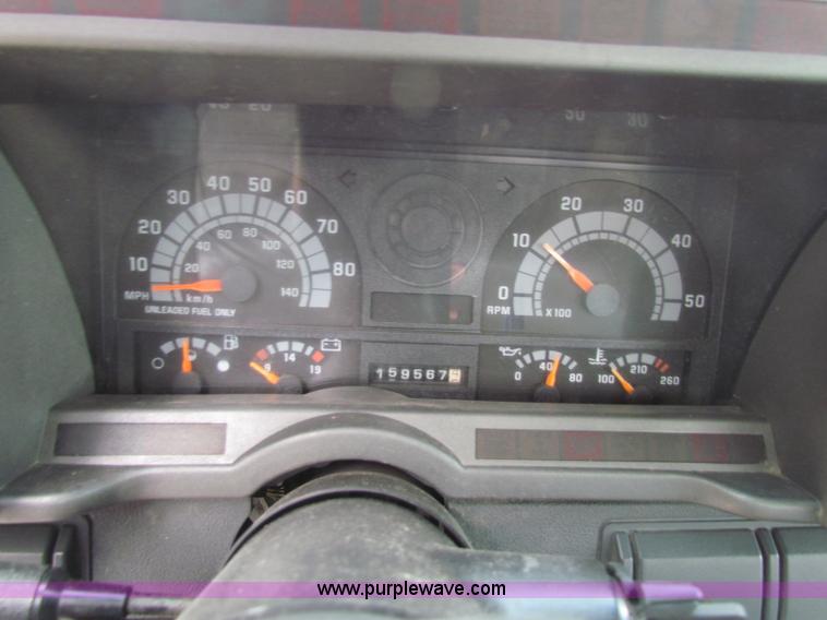 image for item B7370 1999 GMC C5500 flatbed truck