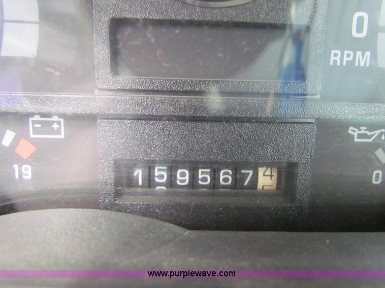 image for item B7370 1999 GMC C5500 flatbed truck