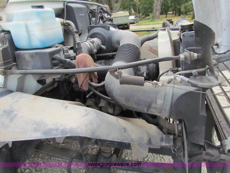 image for item B7370 1999 GMC C5500 flatbed truck