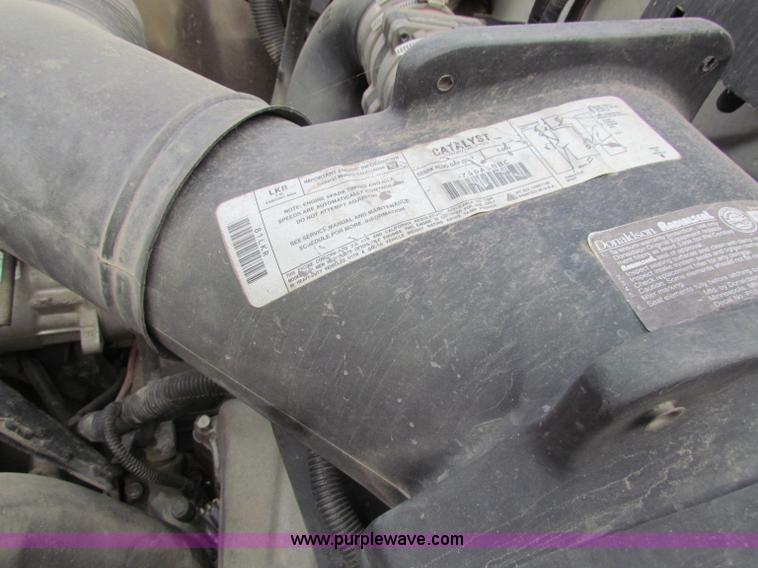 image for item B7370 1999 GMC C5500 flatbed truck