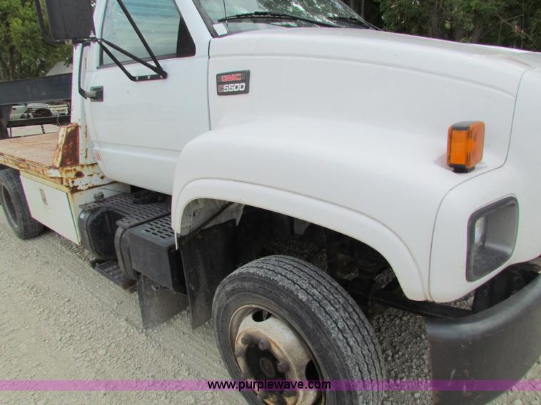 image for item B7370 1999 GMC C5500 flatbed truck