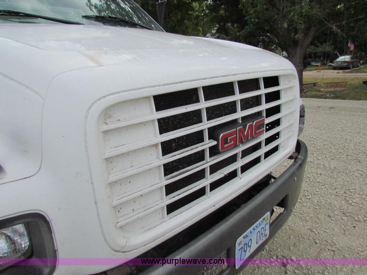 image for item B7370 1999 GMC C5500 flatbed truck