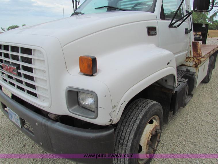 image for item B7370 1999 GMC C5500 flatbed truck