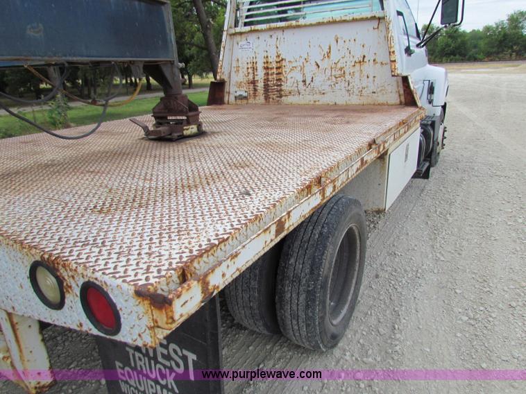 image for item B7370 1999 GMC C5500 flatbed truck
