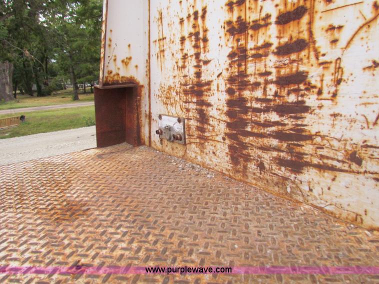 image for item B7370 1999 GMC C5500 flatbed truck