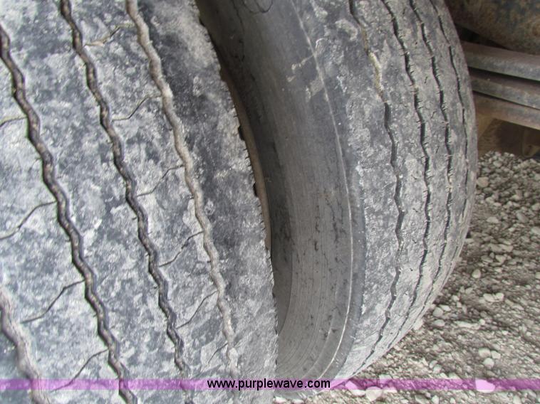 image for item B7370 1999 GMC C5500 flatbed truck