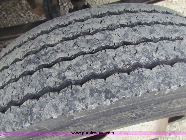 image for item B7370 1999 GMC C5500 flatbed truck