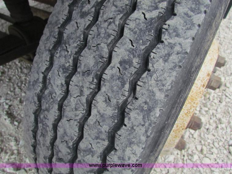 image for item B7370 1999 GMC C5500 flatbed truck