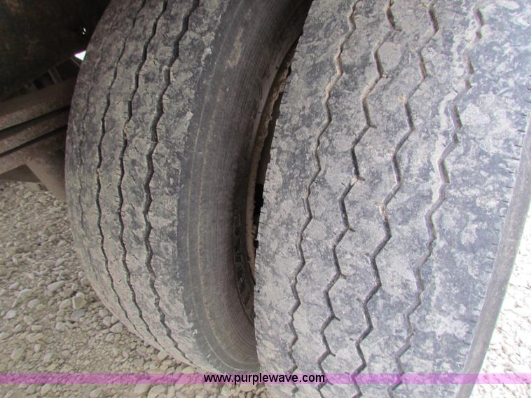 image for item B7370 1999 GMC C5500 flatbed truck