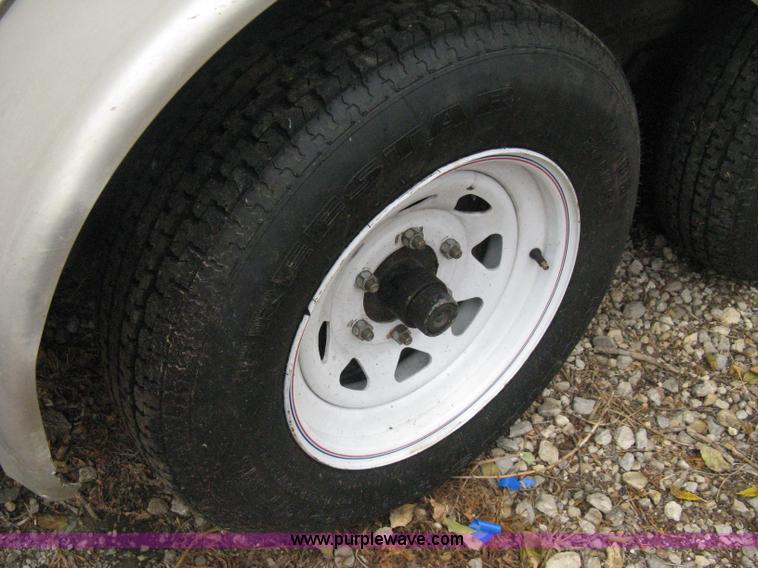 image for item B8033 2004 H & H tandem axle cargo trailer