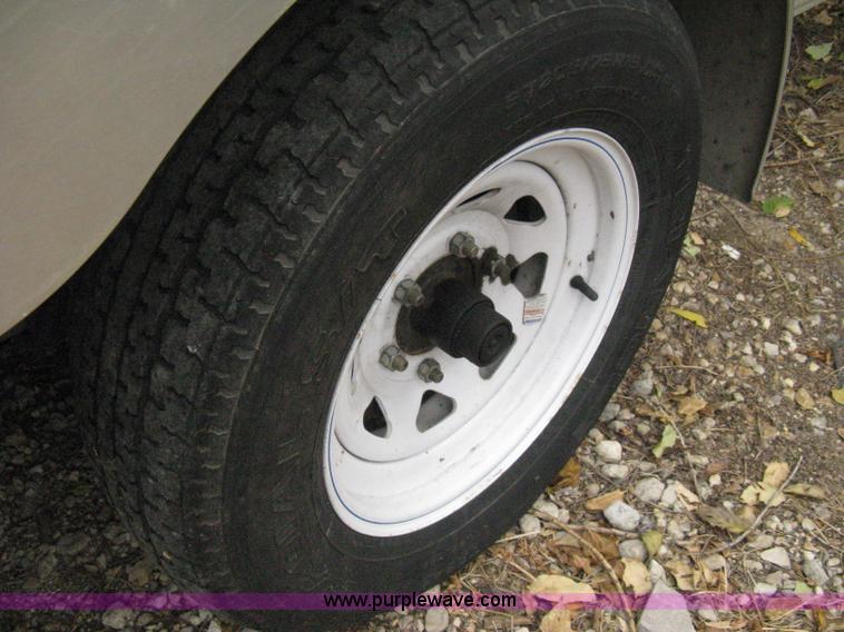 image for item B8033 2004 H & H tandem axle cargo trailer