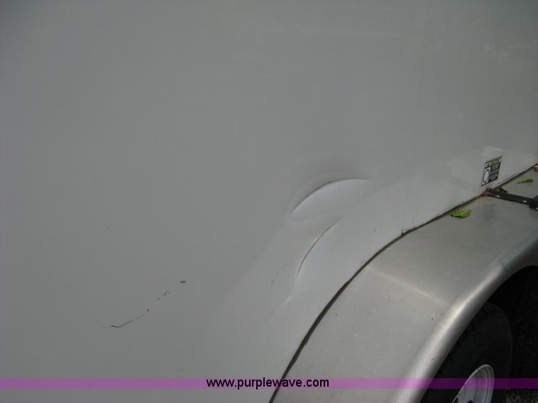 image for item B8033 2004 H & H tandem axle cargo trailer