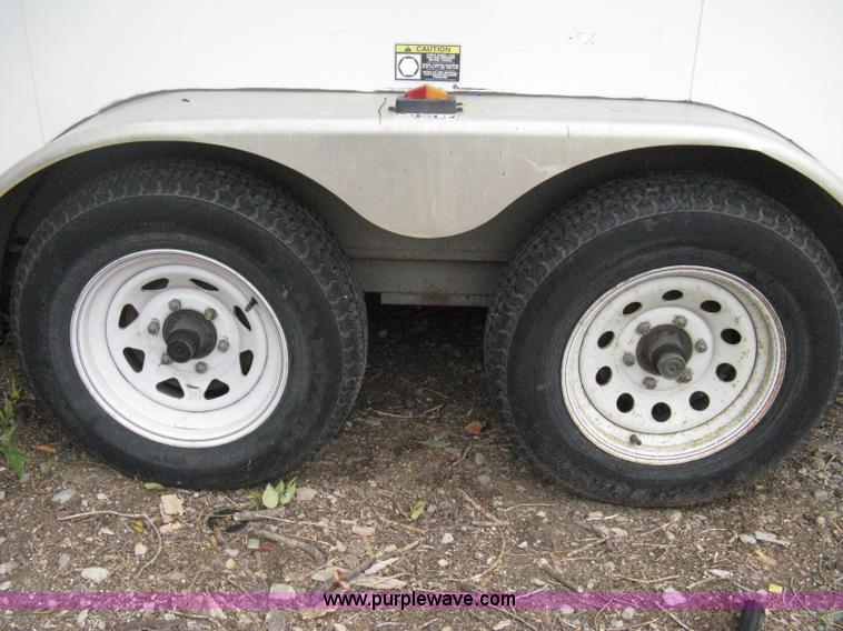 image for item B8033 2004 H & H tandem axle cargo trailer