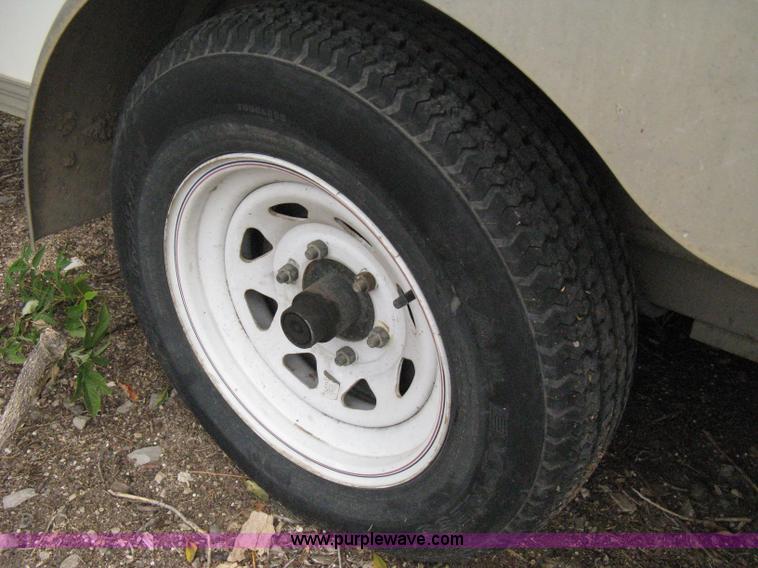 image for item B8033 2004 H & H tandem axle cargo trailer