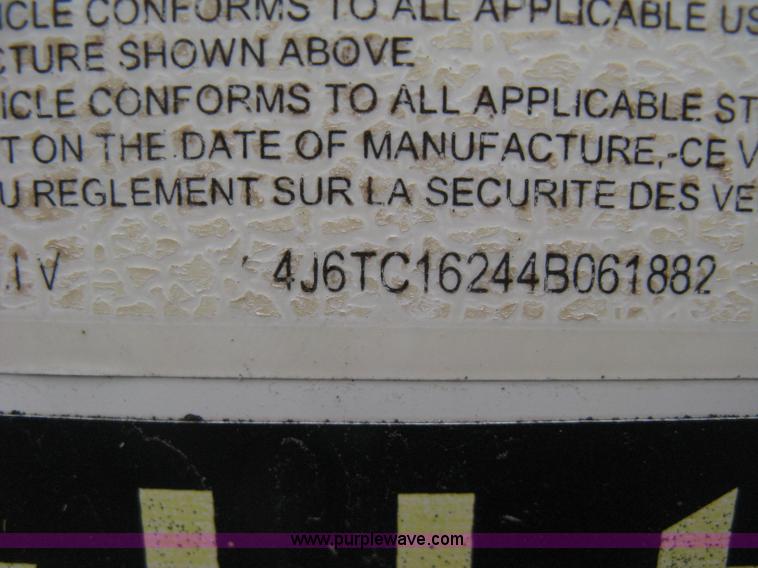 image for item B8033 2004 H & H tandem axle cargo trailer