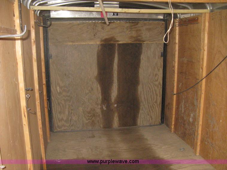 image for item B8033 2004 H & H tandem axle cargo trailer