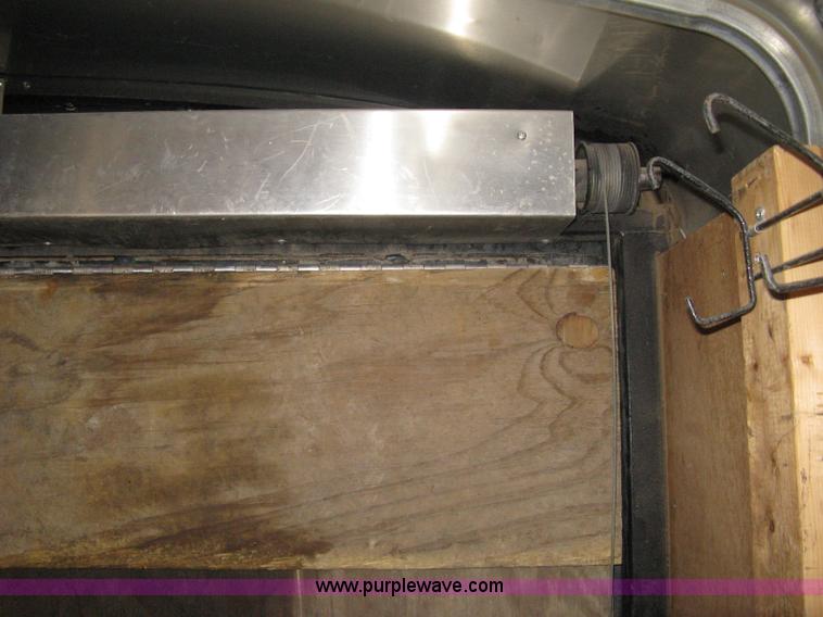 image for item B8033 2004 H & H tandem axle cargo trailer