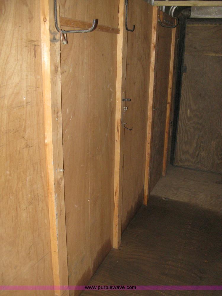 image for item B8033 2004 H & H tandem axle cargo trailer