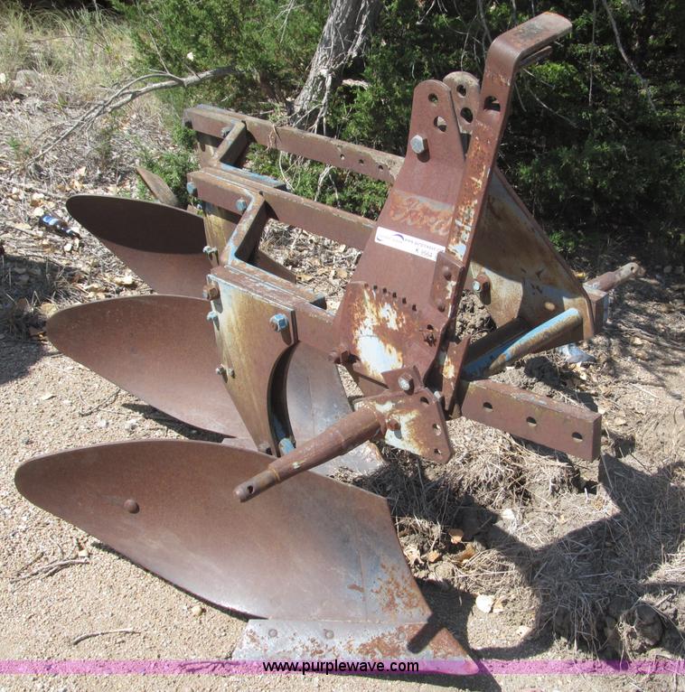 image for item K9564 Ford three bottom plow