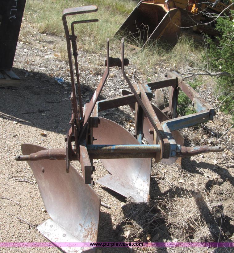 image for item K9564 Ford three bottom plow