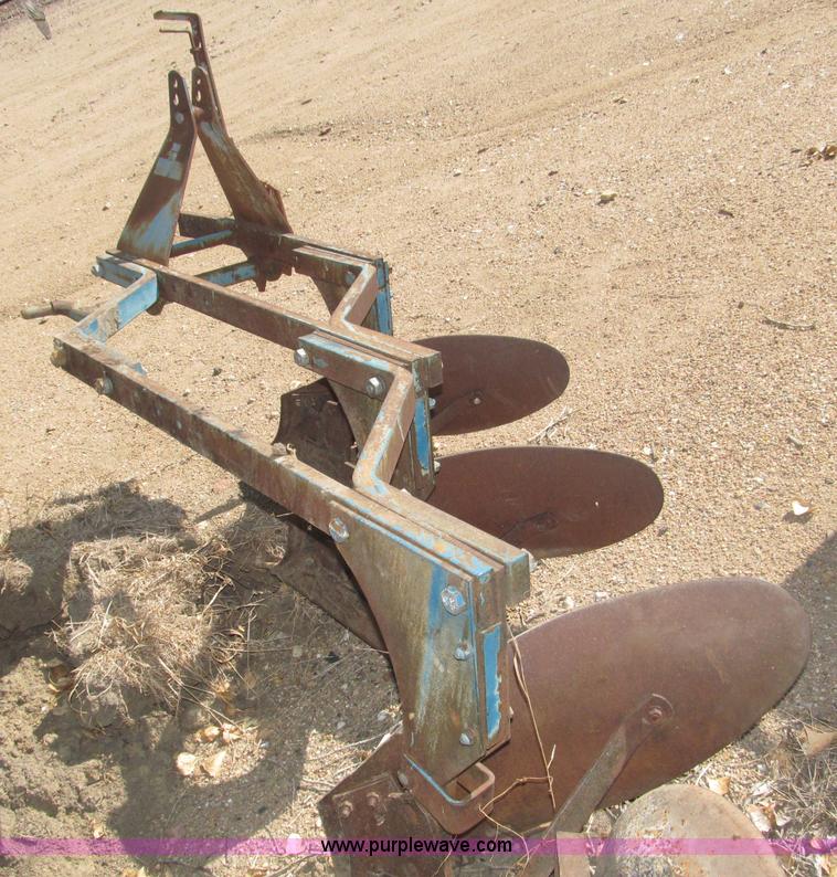 image for item K9564 Ford three bottom plow