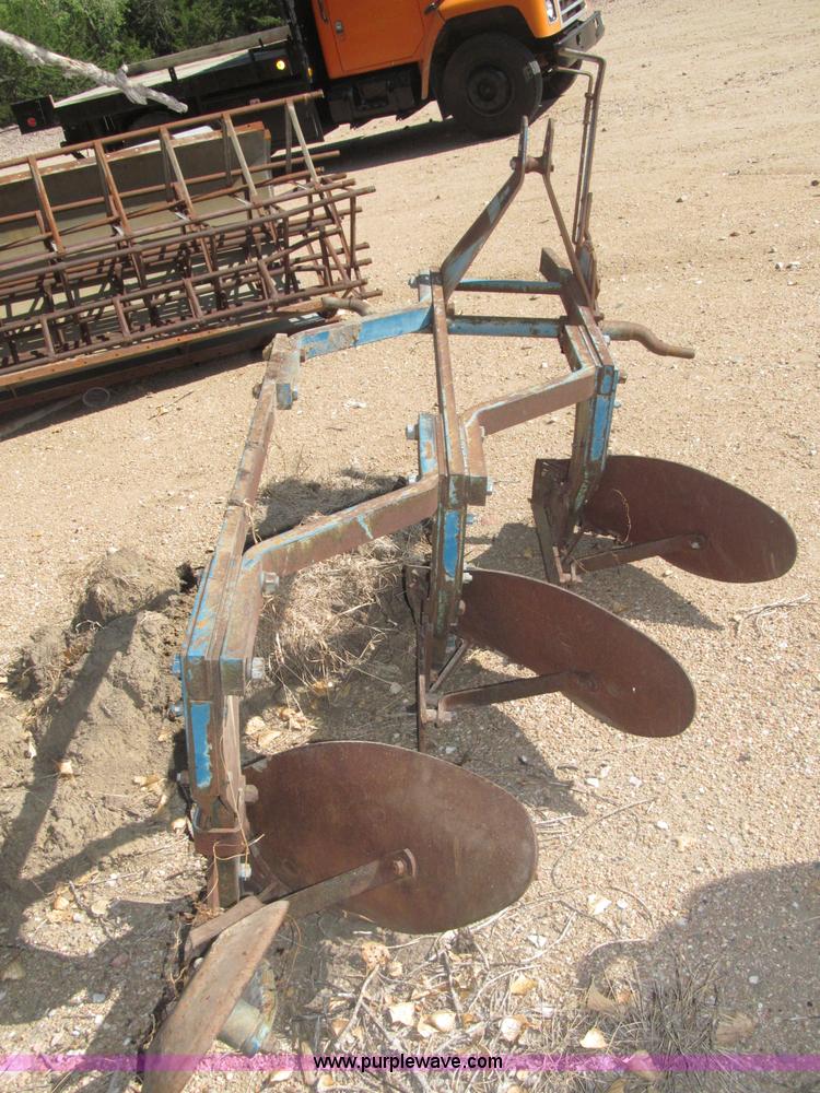 image for item K9564 Ford three bottom plow