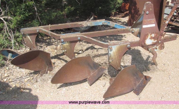 image for item K9564 Ford three bottom plow