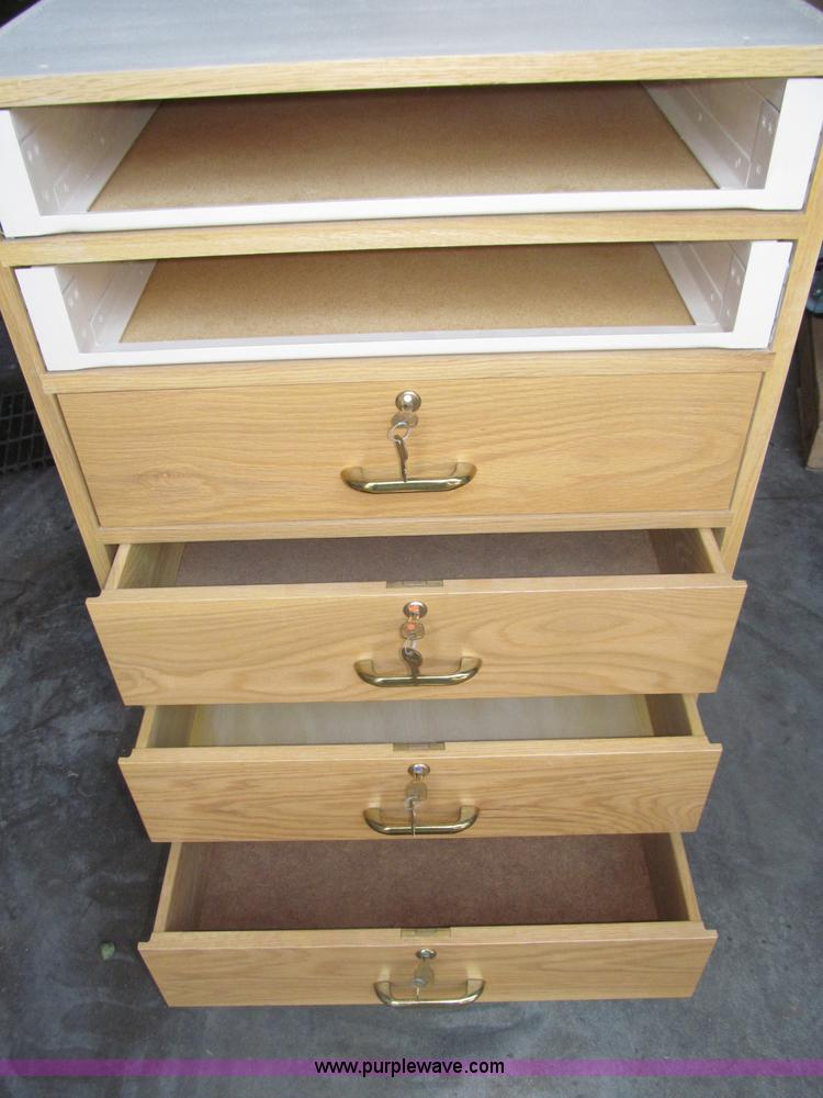 (22) 25.25"W x 23"D x 41"H wood in Lincoln, NE Item K9573 sold Purple Wave