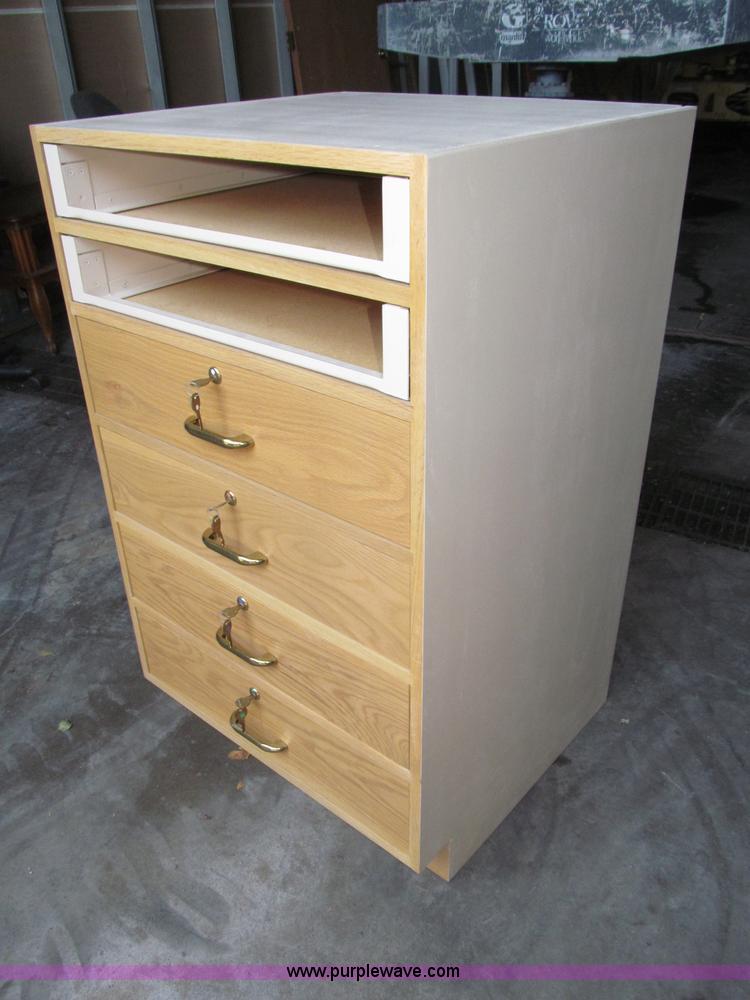 (22) 25.25"W x 23"D x 41"H wood in Lincoln, NE Item K9574 sold Purple Wave