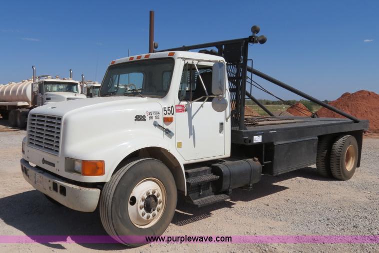 image for item B2457 1997 International 4700 winch truck