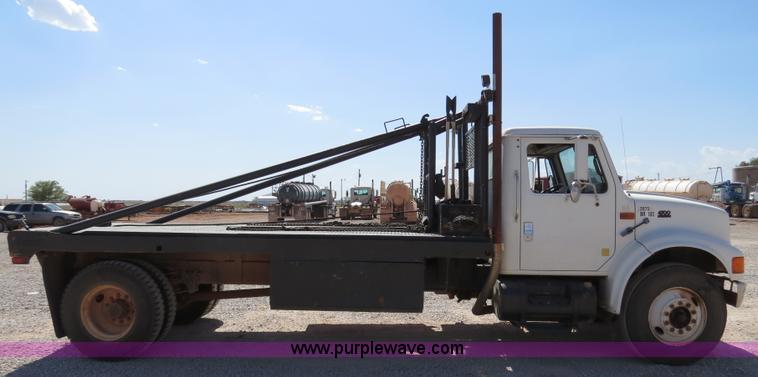 image for item B2457 1997 International 4700 winch truck