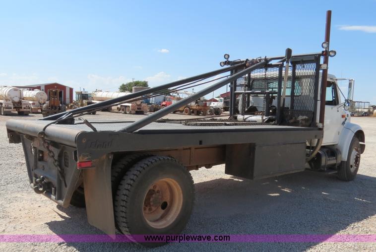 image for item B2457 1997 International 4700 winch truck