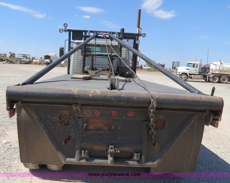 image for item B2457 1997 International 4700 winch truck