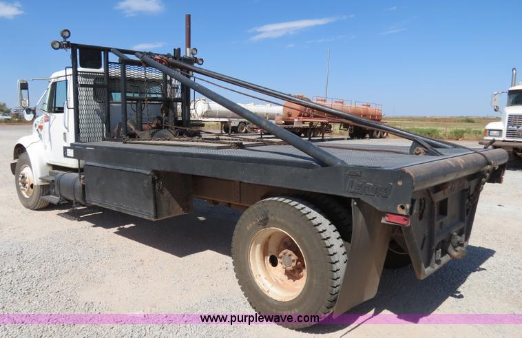image for item B2457 1997 International 4700 winch truck