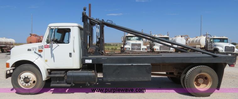 image for item B2457 1997 International 4700 winch truck
