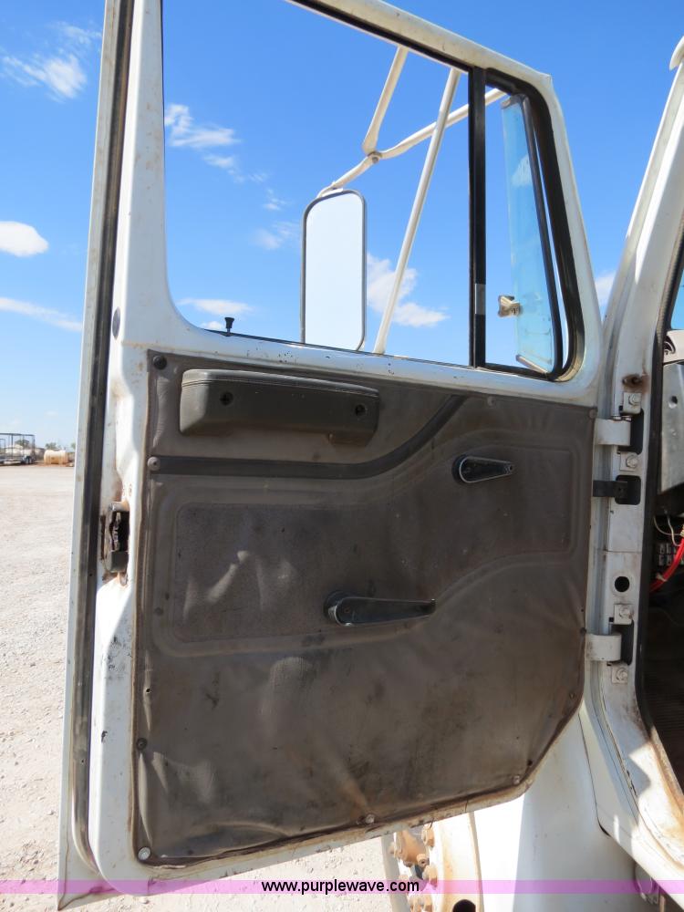 image for item B2457 1997 International 4700 winch truck