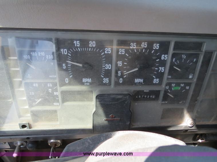 image for item B2457 1997 International 4700 winch truck