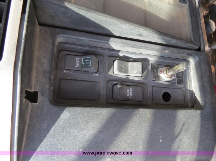 image for item B2457 1997 International 4700 winch truck