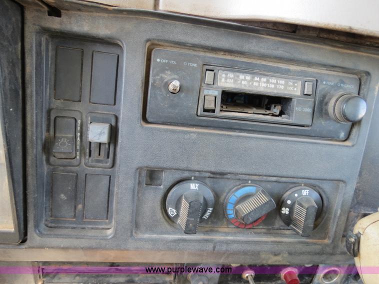 image for item B2457 1997 International 4700 winch truck