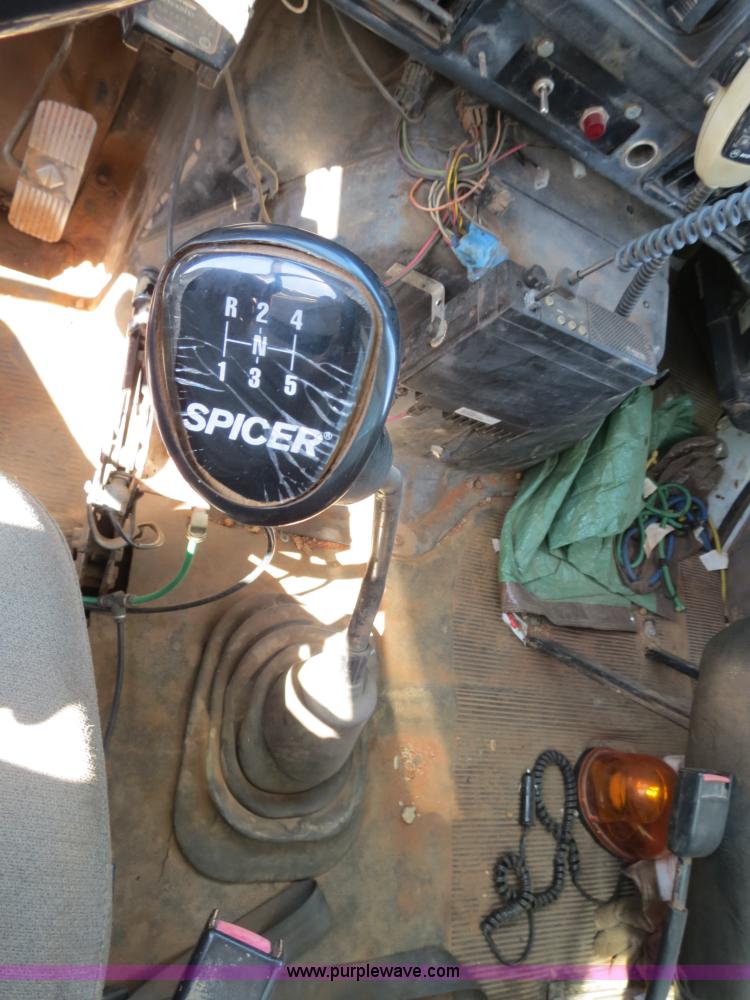 image for item B2457 1997 International 4700 winch truck